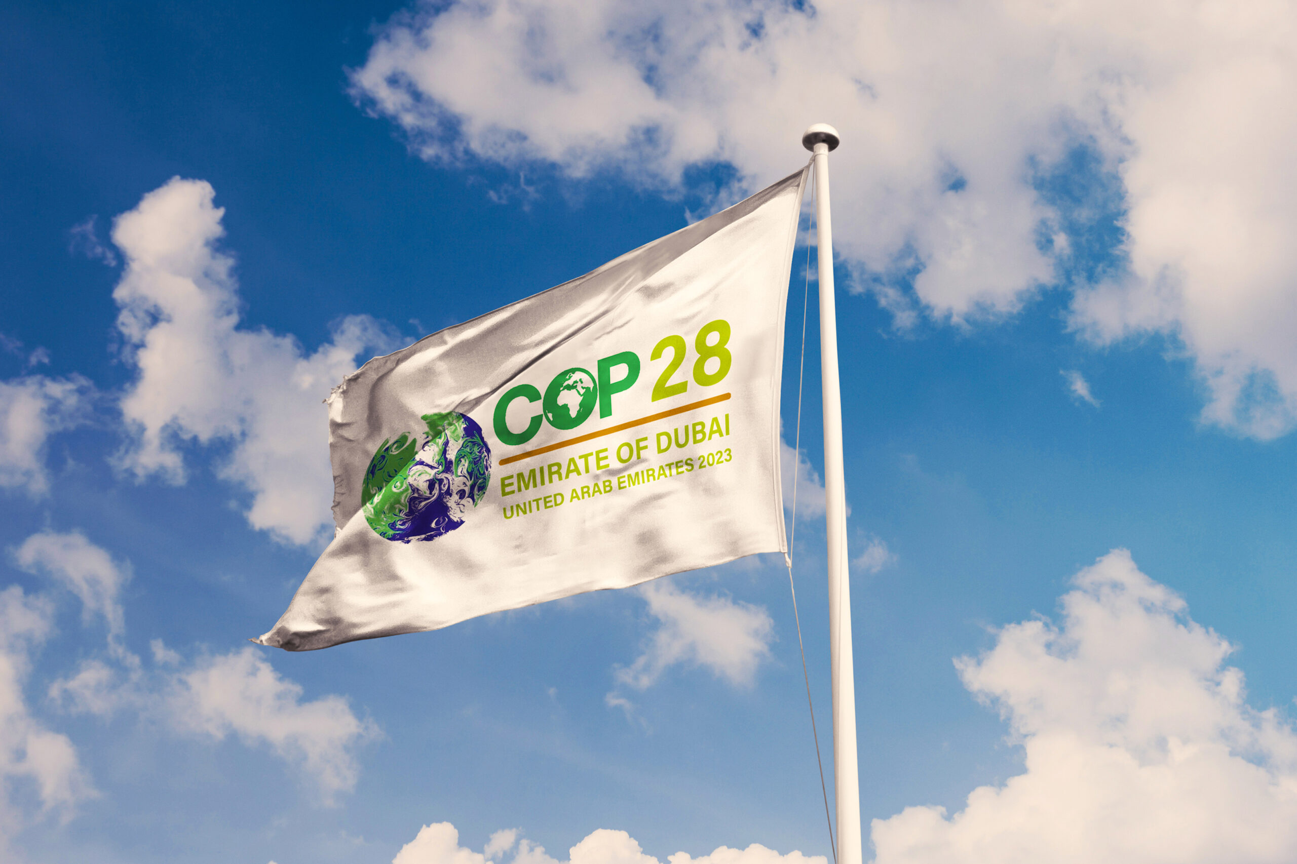 November 10, 2022, Brazil. The 2023 United Nations Climate Change Conference COP28 soon appears on a flag. Event will be on 6-17 November 2023, in Emirate of Dubai, United Arab Emirates.